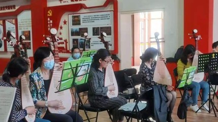 一揉玉弦萬般情，彈支紅曲給黨聽 文化藝術交流的深情頌歌